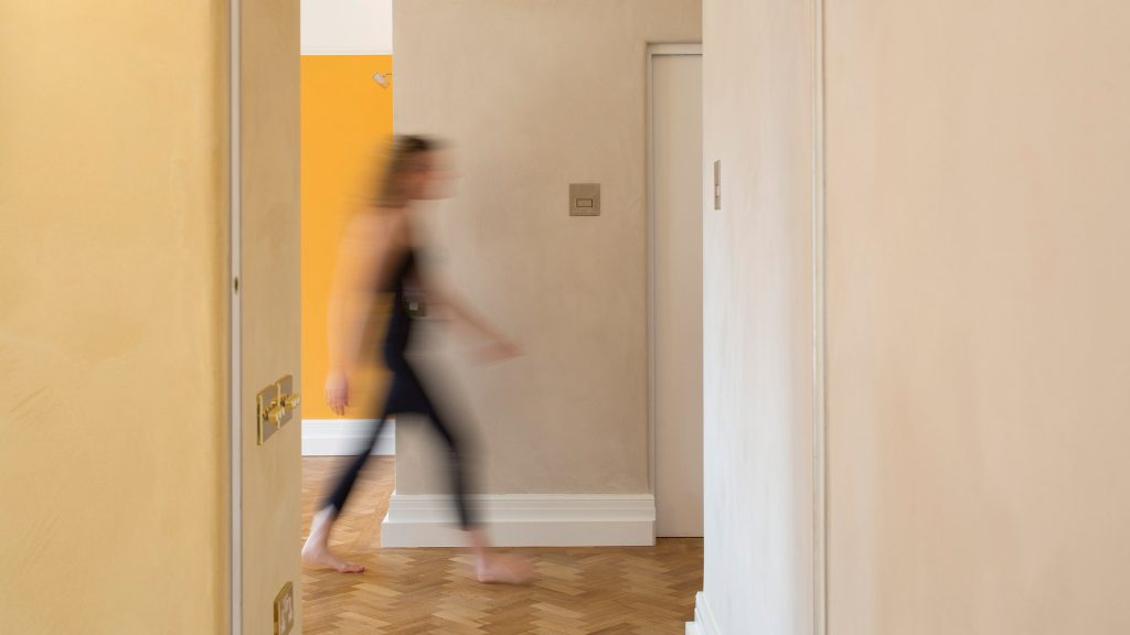 Residential - Sustainable interior design - A corner of a home with Clayworks clay wall finish and parquet flooring